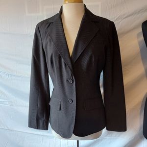 Black and white pin stripe suit